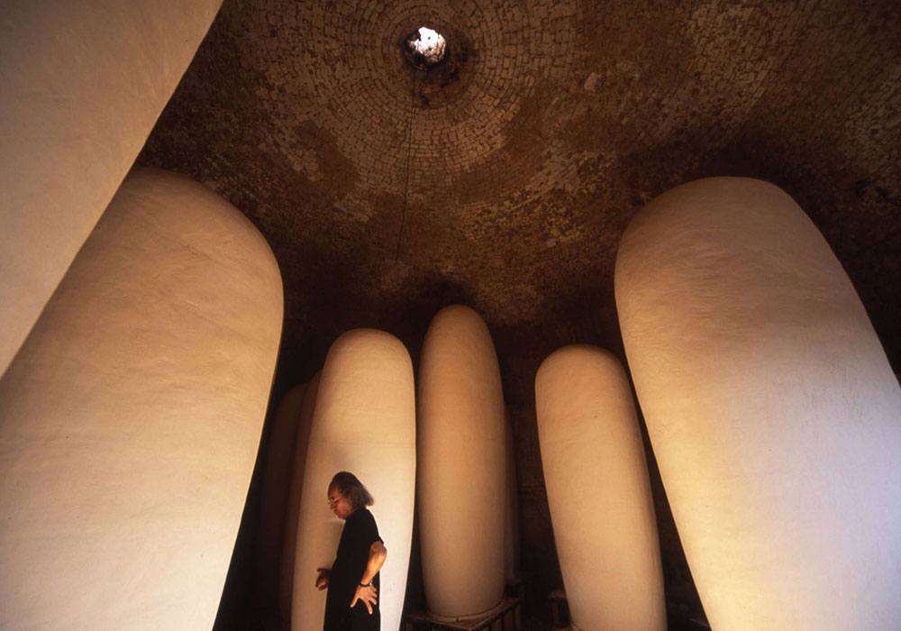 Examining bisque-fired sculptures in the kiln at Mission Clay Products in Pittsburg, KS, 2006.