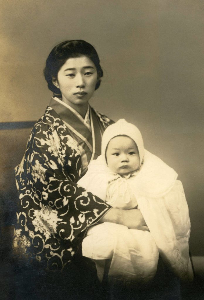 Toyoko Ono holding 3-month-old Jun Kaneko