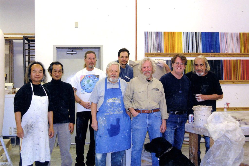 Work session at Jun Kaneko Studio. From left to right: Jun Kaneko, Goro Suzuki, Michael Sarich, Rudy Autio, John Balistreri, Gerry Eskin, Jimmy Clark, Peter Voulkos.